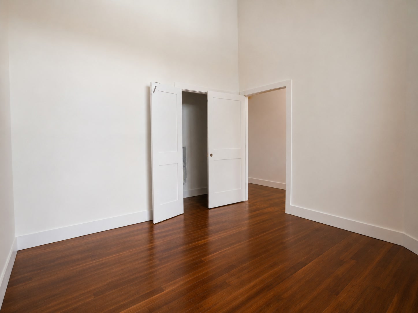 Bedroom with double-door closet